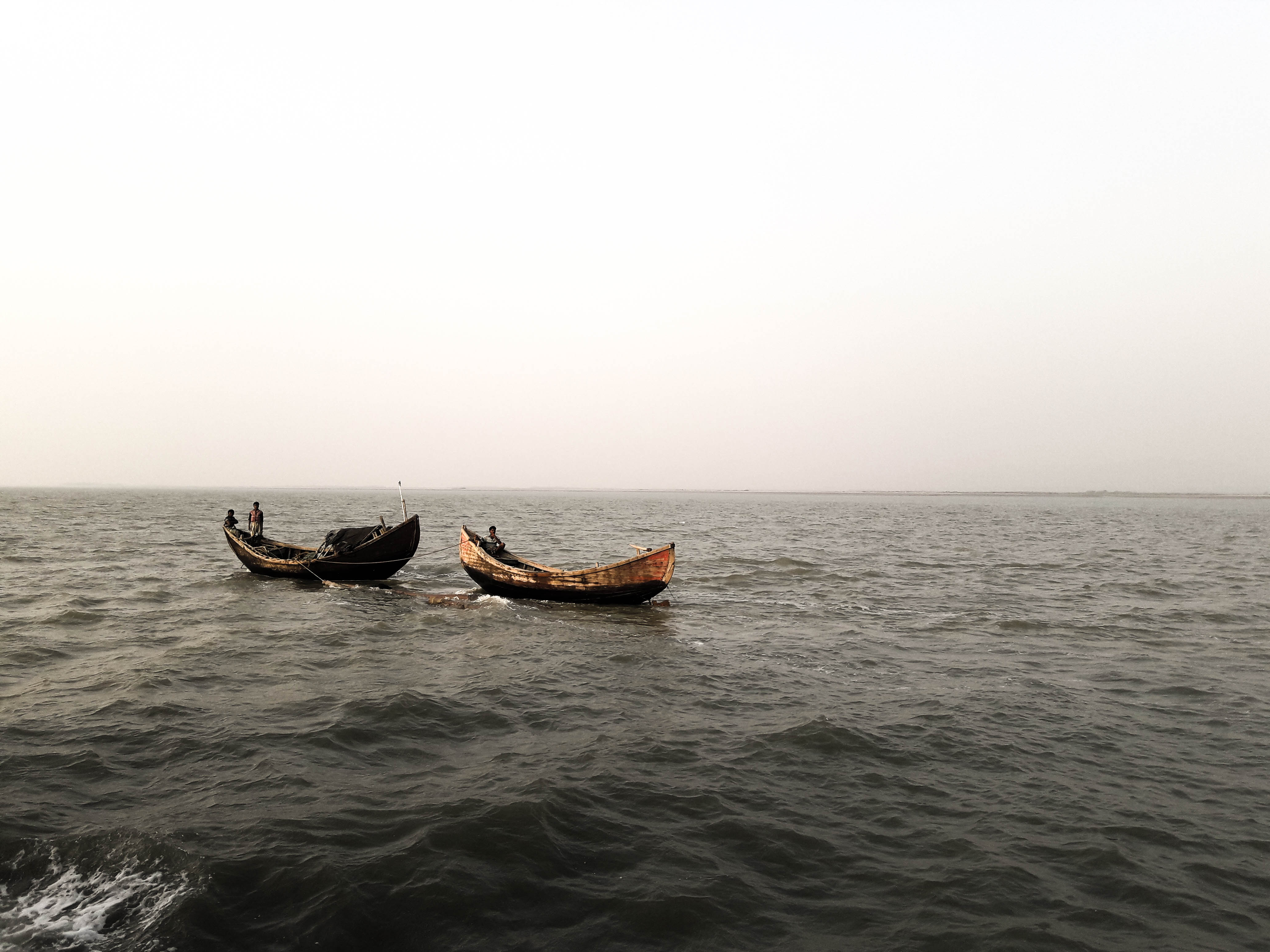Two fishing boats somewhere on the Naf river on the way to the Cox's Bazar.